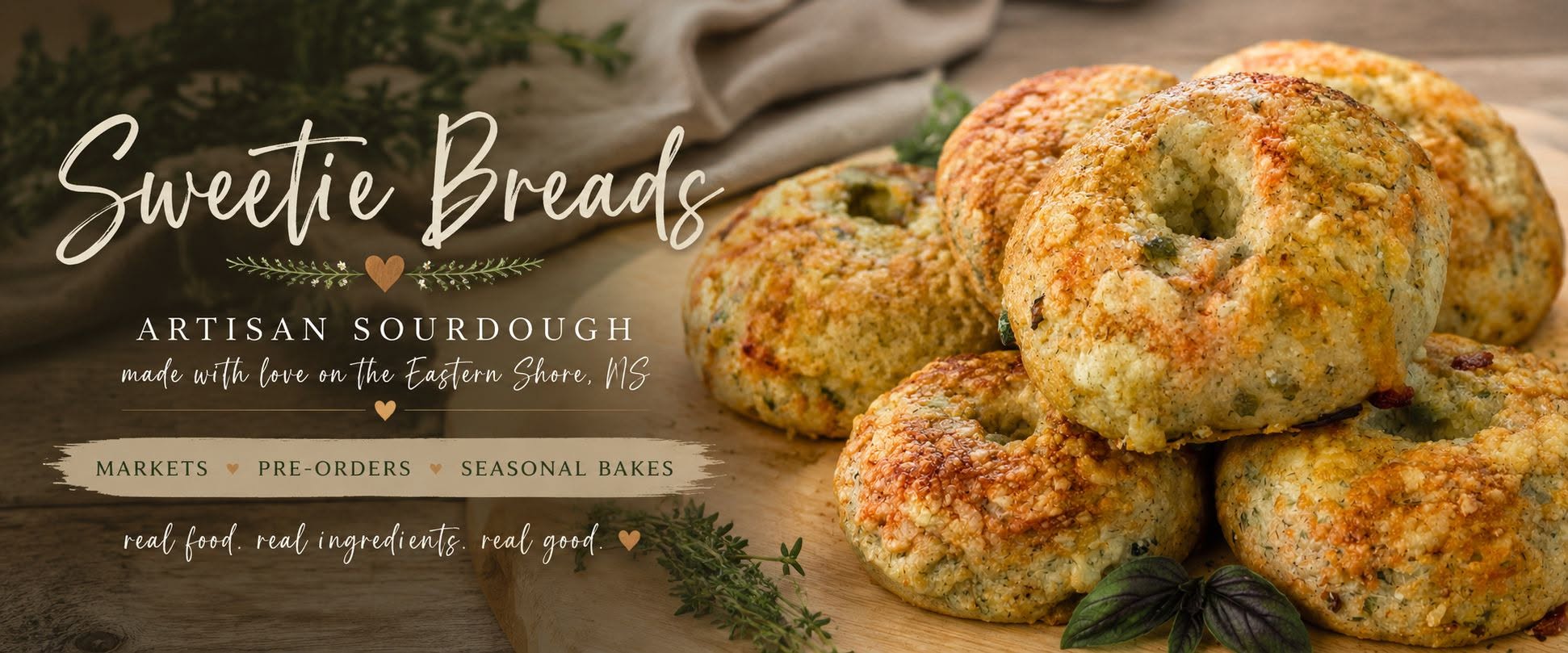 Golden cheesy sourdough bagels with fresh herbs